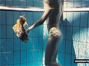 torrid massive breasted teenager Lera swimming in the pool